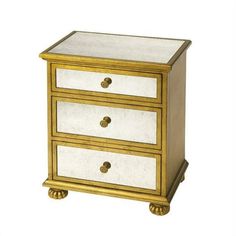 a white and gold dresser with two drawers