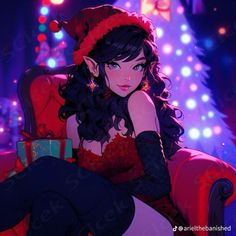 a woman sitting on top of a red chair in front of a christmas tree