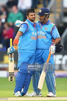 Suresh Raina (L) of India is congratulated by capatin MS Dhoni (R) after reaching his century during the second Royal London One-Day Series match between England and India at the SWALEC Stadium on August 27, 2014 in Cardiff, Wales. Msd And Suresh Raina, Dhoni Raina Friendship, Suresh Raina Wallpapers Hd, Dhoni 7, Suresh Raina, Cricket Player, Women Lawyer, Cricket Players