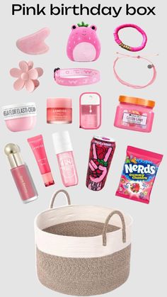 a pink birthday box with various items in it