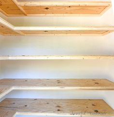 empty shelves in the corner of a room