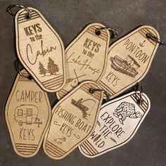 six wooden tags with different types of campers and rving related items on them