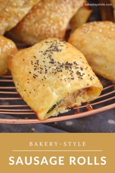 baked pastries on a wire rack with text overlay reading bakery - style sausage rolls