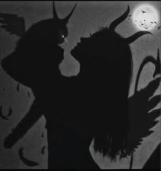 the shadow of a woman with horns on her head is shown in front of a full moon