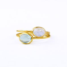 You'll love this ring combo set with your choice of natural gemstones. Available in bright sterling silver, 18k vermeil gold, or rose gold. Gemstone are approximately 5mm x 7mm in size. Open back setting. Band stamped with 925 on inside. If you plan stacking the rings on the same finger please choose one size up. METAL   ✦ 18K VERMEIL GOLD   ✦ ROSE GOLD   ✦ 925 STERLING SILVER Please note that we use alternative birthstones for some months and offer multiple birthstone options to select from for Adjustable Topaz Ring For Anniversary, Fine Jewelry Natural Stones Gemstones For Anniversary, Gift Yellow Gold Oval Cabochon Rings, Stackable Topaz Ring As Gift, Handmade Oval Yellow Gold Stackable Rings, Stackable Topaz Ring Gift, Adjustable Fine Jewelry Moonstone Ring, Adjustable Moonstone Ring In Fine Jewelry Style, Yellow Gold Oval Cabochon Rings For Gift