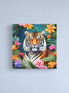 a tiger surrounded by tropical flowers and leaves