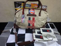 a bag sitting on top of a checkered table cloth