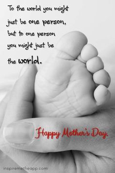 a hand holding a baby's foot with the words happy mother's day