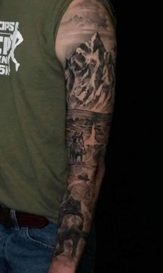 a man with a tattoo on his arm