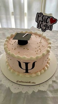 a cake with a graduation cap on top