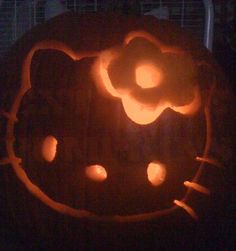 a hello kitty pumpkin carved to look like it has been carved into the shape of a flower