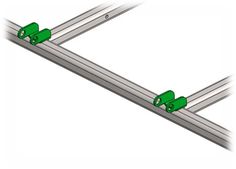 two metal bars with green handles on each end and one is parallel to the other