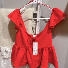 Urban Outfitters Red Crop Top With Tie In Front. Size Xs. New With Tags. Original Price $59.00 Red V-neck Top From Urban Outfitters, Red Short Sleeve Crop Top For Summer, Red Summer Top For Day Out, Red Tops For Summer Day Out, Urban Outfitters Summer V-neck Blouse, Red Crop Top For Summer, Urban Outfitters Summer Beach Blouse, Summer V-neck Blouse By Urban Outfitters, Red V-neck Crop Top For Spring