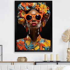 This beautiful "Orange And Blue African Woman Sunglasses II" wall art is printed on premium quality cotton canvas using the finest fade-resistant ink. We offer a versatile range to cater to your unique aesthetic preferences. The canvas art is stretched tautly over a sturdy wood, giving your artwork a sleek, borderless appearance. For those who desire a touch of elegance and depth, our canvas art is the ideal choice. The canvas is delicately mounted within, creating a striking visual contrast bet African American Wall Art, Hair Print, Product Art, Black Picture Frames, Designer Glasses, Gold Picture Frames, Traditional Clothes, American Woman, African American Women