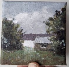 a painting of a house in the middle of a field with trees and clouds above it