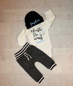 "Worth the wait baby boy outfit! Shown with black wording, pale blue stars and personalized name! Such a sweet set! This is a perfect outfit to bring home you precious new little one and makes a wonderful keepsake forever! COLORS: Colors will be as shown in the main photo (black & pale blue) unless another color is requested in the notes with your order. Slide over photo for FONT color chart, leave changes in the notes. (note if color is for stars or wording) HAT COLORS: Beanie 0-6 months (r Baby Clothes Newborn, Personalized Baby Clothes, Baby Boy Clothing Sets, Star Baby Showers, Paper Ribbon, Worth The Wait