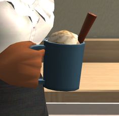 a woman holding a cup with ice cream in it