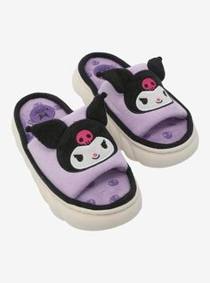 Lounge around in mischievous style! These comfy slide sandals feature Kuromi's face embroidered on the top strap with 3D ear detailing. The lining features an allover print of her signature skull.S: 56M: 78L: 910XL: 1112Listed in women's sizes.Polyester upper; TPR & EVA soleImported Kiromi Shoes, Kuromi Items, 2d Cafe, Kuromi Clothes, Purple Slippers, Kuromi Plush, Hello Kitty Shoes, Cute Everyday Outfits, Pretty Shoes