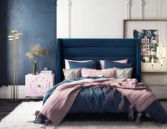 a bedroom with blue and pink bedding, white rugs and an art work on the wall