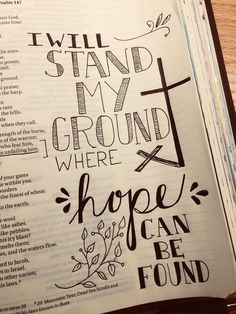 an open bible with the words i will stand my ground where hope can be found