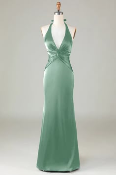 Details:   Indulge in luxury with our Mermaid Halter Dark Green Long Satin Bridesmaid Dress. This stunning halter maxi dress in a gorgeous dark green hue exudes elegance and sophistication. Perfect for any special occasion, this dress is sure to make a statement. Made with high-quality satin fabric, this dress is perfect for formal events and weddings. Its timeless design and luxurious material will make any bridesmaid feel elegant and sophisticated.    Features:    Silhouette: Sheath Style Sheath Prom Dress, Satin Bridesmaid Dress, Yule Ball, Neck Deep, Fish Tail, Satin Bridesmaid Dresses, Fairytale Dress, Sophisticated Dress, Causual Outfits