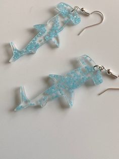 These adorable acrylic earrings glow in the dark. The sharks are about 1.5 inches! Shark Earrings, Acrylic Earrings, Dream Jewelry, Glow In The Dark, The Darkest, Jewelry Earrings Dangle, Etsy Earrings, Dangle Drop Earrings, Gems