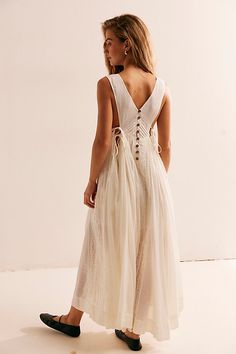 Effortlessly ethereal, this breezy maxi from our free-est collection will turn heads all season long. **Fit:** Billowy, trapeze-style silhouette **Features:** Scoop neckline, pleating and crochet lace trimming throughout, dropped armholes, back tie detailing **Why We ❤ It:** Stunning with strappy heels or easy with beachy sandals, this style has endless ways to wear. | Coastal Core Maxi Dress by free-est at Free People in White, Size: S White Free People Dress, Boho Wedding Reception Dress, Proposal Dresses, Free People Wedding Dress, Boho White Dress, Beach Elopement Dress, Cruise Outfit Ideas, Free People White Dress, Vietnam Clothes