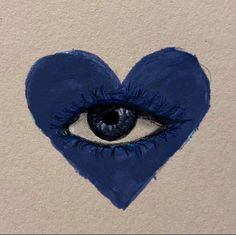 a blue heart with an eye painted on it