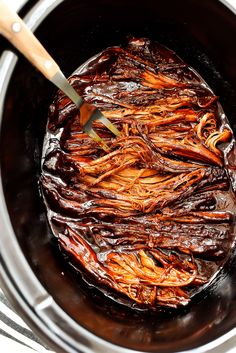 the food is being cooked in the pot