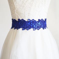 "Beautiful and lovely royal blue embroidery flower lace sash with satin ribbon.  Hand sews 2 1/4\" royal blue flower lace on top of 1.5\" satin ribbon. The lace portion is 18\" long and the total sash length is 105\" long. Your blue lace sash will come beautifully wrapped in a lovelike gift box.  If you have any questions, please just convo me. Thanks :)  ♥ 2 1/4\" lace portion - 18\"   ♥ 1.5\" royal blue satin ribbon  ♥ Style - Adult sash 105\" / flower girl sash 78\"    ♥ ♥ ♥ ♥ ♥ ♥ ♥ ♥ ♥ ♥ ♥ ♥ Wedding Dress Sash Belt, White Lace Garter, Blue Sash, Royal Blue Flowers, Lace Garter Set, Lace Sash, Bridesmaid Sash, Ribbon Style, Something Blue Bridal