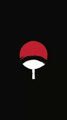 a red and white mushroom on a black background