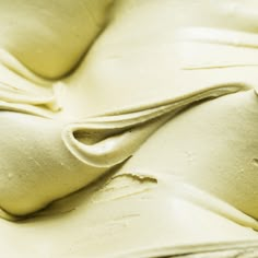 a close up view of some white frosting