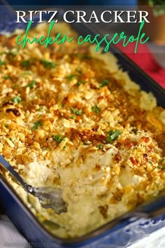 a casserole dish with chicken, cheese and parsley on top in a blue pan