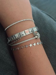 Many Bracelets On Arm, Silver Stacked Bracelets, Silver Stacking Bracelets, Silver Bracelets Aesthetic, Bracelet Stack Ideas, Bracelet Combos, Silver Bracelet Stack, Silver Jewlery, Silver Watches Women