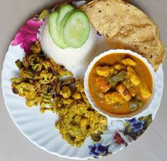 a white plate topped with different types of food