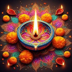 a colorful diya with candles and pom poms around it