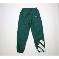 Vtg 90s Adidas Mens Medium Spell Out Big Logo Lined Nylon Joggers Pants Green Mens Pants Blemishes front right, waistband, back left. Inner bottom lining is ripped and has blemishes Mens size Medium Measurements are: 14 inches across the waist laid flat 32 inch inseam 43 inches from top to bottom Green Nylon US Shipping is FREE Canada is $15 and International is $24 Check out my other items in my store! PR1491 Sporty Green Full-length Parachute Pants, Green Sporty Parachute Pants, Green Nylon Parachute Pants For Streetwear, Green Parachute Pants For Streetwear, Green Full-length Parachute Pants For Streetwear, Green 90s Style Streetwear Bottoms, Retro Green Bottoms For Streetwear, Green Retro Bottoms For Streetwear, 90s Style Sports Pants With Pockets