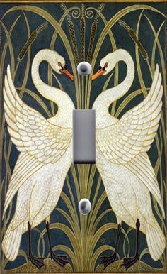 two white swans are standing next to each other in front of a light switch cover