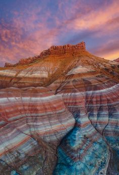 the desert is covered in colorful rock formations