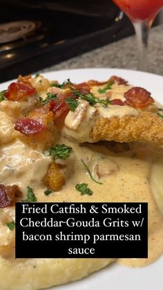 fried catch and smoked cheddar - gourd grits with bacon shrimp parmesan sauce