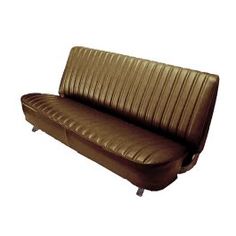 a brown leather couch sitting on top of a white floor