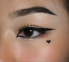 Eyeliner Heart On Cheek, Heart Eyeliner Stamp Looks, Heart Under Eye Makeup, Eyeliner Heart Under Eye, Asian Eyeliner Hooded, Eyeliner With Heart, Epicanthic Fold Eyeliner, Eyeliner Designs Simple