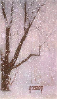 a snowy day with a bench and tree in the foreground, snow falling on the ground