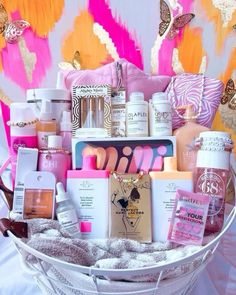 a white basket filled with lots of beauty products