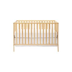 a small wooden crib with white sheets on the bottom and sides, against a white background