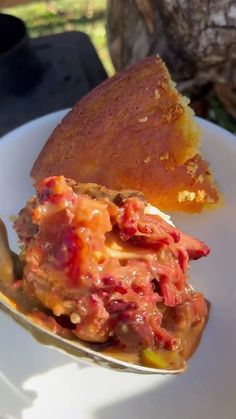 a piece of pie sitting on top of a white plate