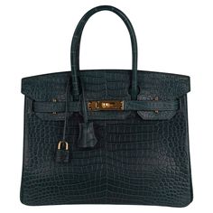 Mightychic offers an exquisite Hermes Birkin 30 bag is featured in in lush deep Vert Fonce Porosus Crocodile. This exotic Hermes Birkin bag in matte Porosus crocodile skin has magnificent scales. The most exclusive and coveted Porosus skin is produced with the smallest and most symmetrical scales. Today Porosus crocodile is very rare and difficult to procure. Accentuated with lush gold hardware. Comes with the lock and keys in the clochette, sleepers, raincoat signature Hermes box. NEW or NEVER Rare Birkin Bag, Hermes Crocodile Bag, Houses Mansions, Hermes Birkin Bag, Birkin Bags, Dream Bag, Birkin 30, Crocodile Bags, Hermes Birkin 30