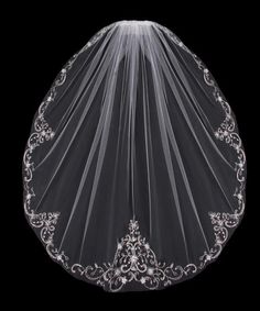 the veil is on display in front of a black background