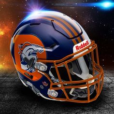 an orange and blue football helmet with the word riddel on it's side