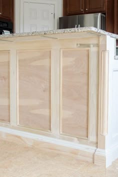 a kitchen island made out of plywood boards